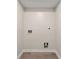 Clean and spacious laundry room with hookups for washer and dryer at 2212 Glendale Dr, Decatur, GA 30032