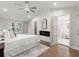 Main bedroom with hardwood floors, fireplace, and en-suite bathroom at 2212 Glendale Dr, Decatur, GA 30032