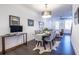 Elegant dining room featuring hardwood floors and a glass dining table at 2487 Figaro Dr, Atlanta, GA 30339