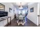 Bright dining room with hardwood floors and a glass-top dining table at 2487 Figaro Dr, Atlanta, GA 30339