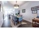 Open dining area with hardwood floors and a stylish dining set at 2487 Figaro Dr, Atlanta, GA 30339