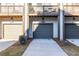 Private garages with parking for townhomes at 2487 Figaro Dr, Atlanta, GA 30339