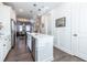 Clean kitchen featuring white cabinets, stainless steel appliances, and an island at 2487 Figaro Dr, Atlanta, GA 30339