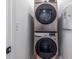 Convenient laundry room with stackable washer and dryer at 2487 Figaro Dr, Atlanta, GA 30339