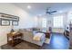 Living room with hardwood floors, sectional sofa, and side table at 2487 Figaro Dr, Atlanta, GA 30339