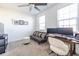 Bright office space featuring a workspace, sofa, and ceiling fan at 2487 Figaro Dr, Atlanta, GA 30339