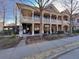 Two-story commercial building with porch and street access at 2671 Caldwell Ne Rd, Brookhaven, GA 30319