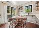 Cozy dining area with wood table and chairs, near deck at 2671 Caldwell Ne Rd, Brookhaven, GA 30319