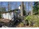 White house exterior with deck and stairs at 2671 Caldwell Ne Rd, Brookhaven, GA 30319