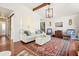 Bright living room with hardwood floors and large windows at 2671 Caldwell Ne Rd, Brookhaven, GA 30319