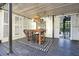 Covered patio with wooden table and chairs at 2671 Caldwell Ne Rd, Brookhaven, GA 30319