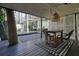 Outdoor patio with wooden table and chairs at 2671 Caldwell Ne Rd, Brookhaven, GA 30319