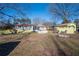 Backyard view of home with shed and fire pit at 2833 Alan Sw Dr, Marietta, GA 30064