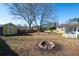 Spacious backyard featuring a shed and fire pit at 2833 Alan Sw Dr, Marietta, GA 30064