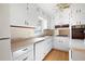 Efficient kitchen featuring white cabinets and hardwood floors at 2833 Alan Sw Dr, Marietta, GA 30064