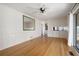 Living room with bamboo floors, ceiling fan, and built-in shelves at 2833 Alan Sw Dr, Marietta, GA 30064