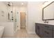 Modern bathroom with double vanity, soaking tub, and glass shower at 530 Fisher Dr # 45, Alpharetta, GA 30009