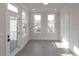 Bedroom with hardwood floors and access to a private balcony at 530 Fisher Dr # 45, Alpharetta, GA 30009