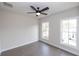 Bright bedroom with two windows and hardwood floors at 530 Fisher Dr # 45, Alpharetta, GA 30009