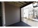 Private deck with gray siding and black metal railing at 530 Fisher Dr # 45, Alpharetta, GA 30009