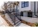 Attractive townhome exterior showing brick facade, black wrought iron railings, and a welcoming entrance at 530 Fisher Dr # 45, Alpharetta, GA 30009