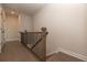Upstairs hallway with hardwood floors and access to bedrooms at 530 Fisher Dr # 45, Alpharetta, GA 30009