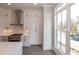 Modern kitchen with white cabinets, stainless steel appliances and large window at 530 Fisher Dr # 45, Alpharetta, GA 30009