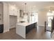 Spacious kitchen with island, stainless steel appliances, and white cabinets at 530 Fisher Dr # 45, Alpharetta, GA 30009