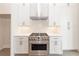 Modern kitchen with stainless steel appliances and white shaker cabinets at 530 Fisher Dr # 45, Alpharetta, GA 30009