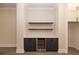 Built-in wet bar with wine cooler and floating shelves at 530 Fisher Dr # 45, Alpharetta, GA 30009