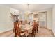 Formal dining room with a chandelier and large table at 1246 Carriage Trace Cir, Stone Mountain, GA 30087