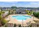 Community pool with a clubhouse and plenty of lounge chairs at 4745 Billow Sw Way, Mableton, GA 30126