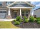 Craftsman style home with stone accents and a welcoming front porch at 4745 Billow Sw Way, Mableton, GA 30126