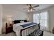 Spacious main bedroom with king-size bed and ensuite bathroom at 770 Dunagan Forest Dr, Lawrenceville, GA 30045