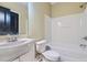 Full bathroom with tub/shower combo, vanity, and toilet at 9972 Ashton Old Rd, Douglasville, GA 30135