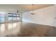 Spacious dining room with hardwood floors and chandelier at 9972 Ashton Old Rd, Douglasville, GA 30135