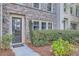 Townhouse front entrance with landscaping at 9972 Ashton Old Rd, Douglasville, GA 30135