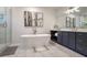 Luxurious bathroom with a soaking tub, walk-in shower, and double vanity at 1247 Holly Nw St # A, Atlanta, GA 30318