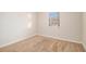 Simple bedroom with carpet, neutral walls, and window at 3901 W Wood Path, Stone Mountain, GA 30083