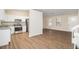 Open concept kitchen with stainless steel appliances and island at 3901 W Wood Path, Stone Mountain, GA 30083