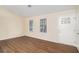 Bright living room featuring hardwood floors and front door at 3901 W Wood Path, Stone Mountain, GA 30083