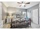 Large bedroom with ceiling fan and stylish decor at 3919 Woodruff Park Way, Buford, GA 30519