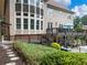 Two-story house back with deck, pool, and landscaping at 1891 Prospect Church Rd, Lawrenceville, GA 30043