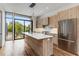 Modern kitchen with stainless steel appliances and island at 105 Georgia Se Ave # 1, Atlanta, GA 30312