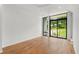 Spacious living room with hardwood floors and large window at 105 Georgia Se Ave # 1, Atlanta, GA 30312