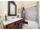 Bathroom with single vanity, tub, and shower at 431 Serenity Ln, Woodstock, GA 30188