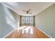 Bright bedroom with hardwood floors and bay window at 1094 Plantation Ct, Villa Rica, GA 30180