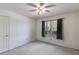 Small bedroom with carpet flooring and window at 1094 Plantation Ct, Villa Rica, GA 30180