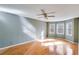 Bright bedroom with hardwood floors and ample natural light at 1094 Plantation Ct, Villa Rica, GA 30180