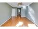 Spacious bedroom featuring hardwood floors and a ceiling fan at 1094 Plantation Ct, Villa Rica, GA 30180